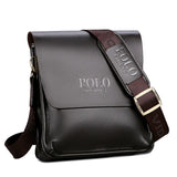 Men’s crossbody shoulder bag in sleek black leather with adjustable strap, styled with Polo logo.