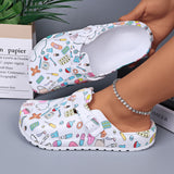 Anti-slip clogs featuring a colorful printed design and adjustable buckle for comfort and safety.